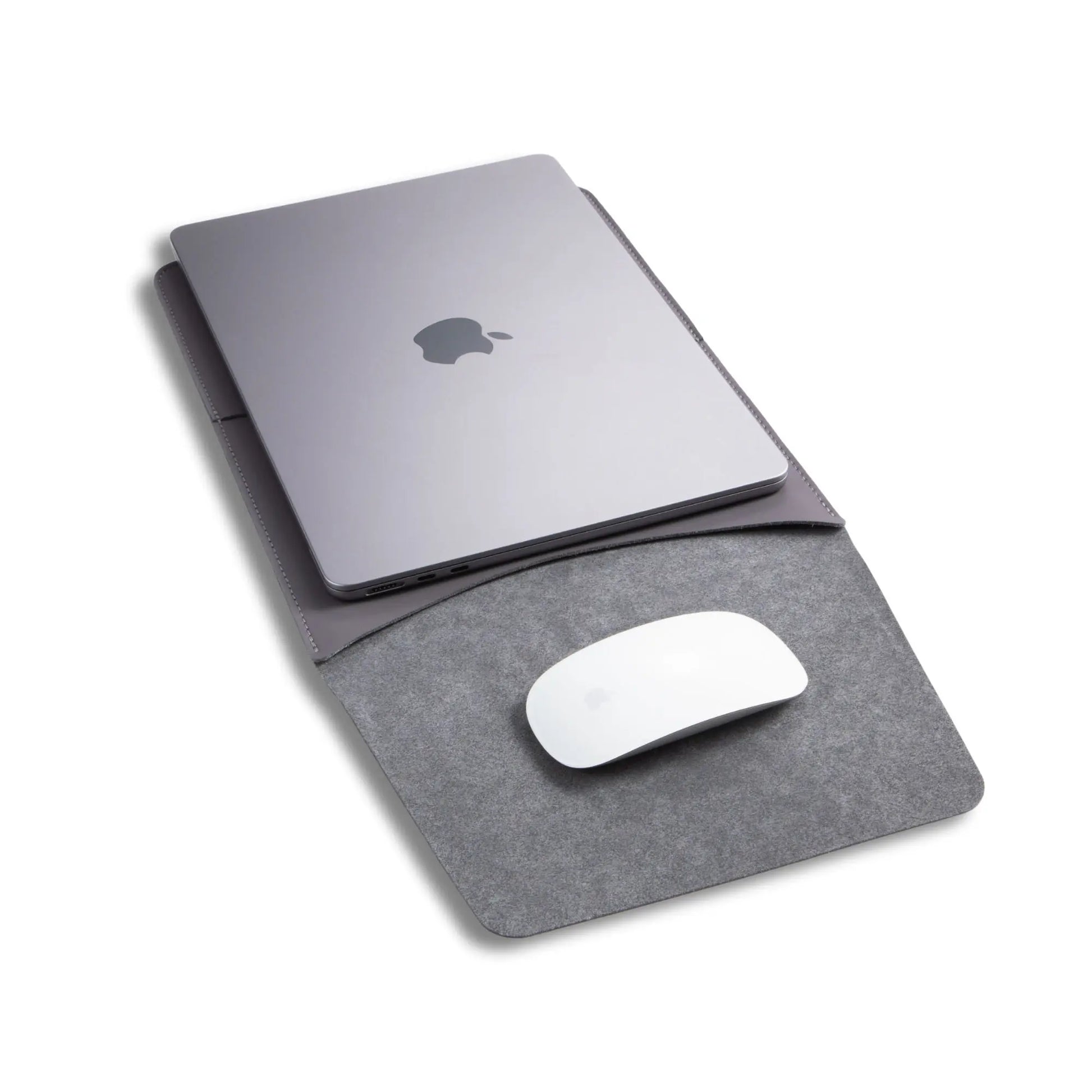 Usage view of antibacterial 3-in-1 vintage gray MacBook leather sleeve with MacBook and Magic Mouse.